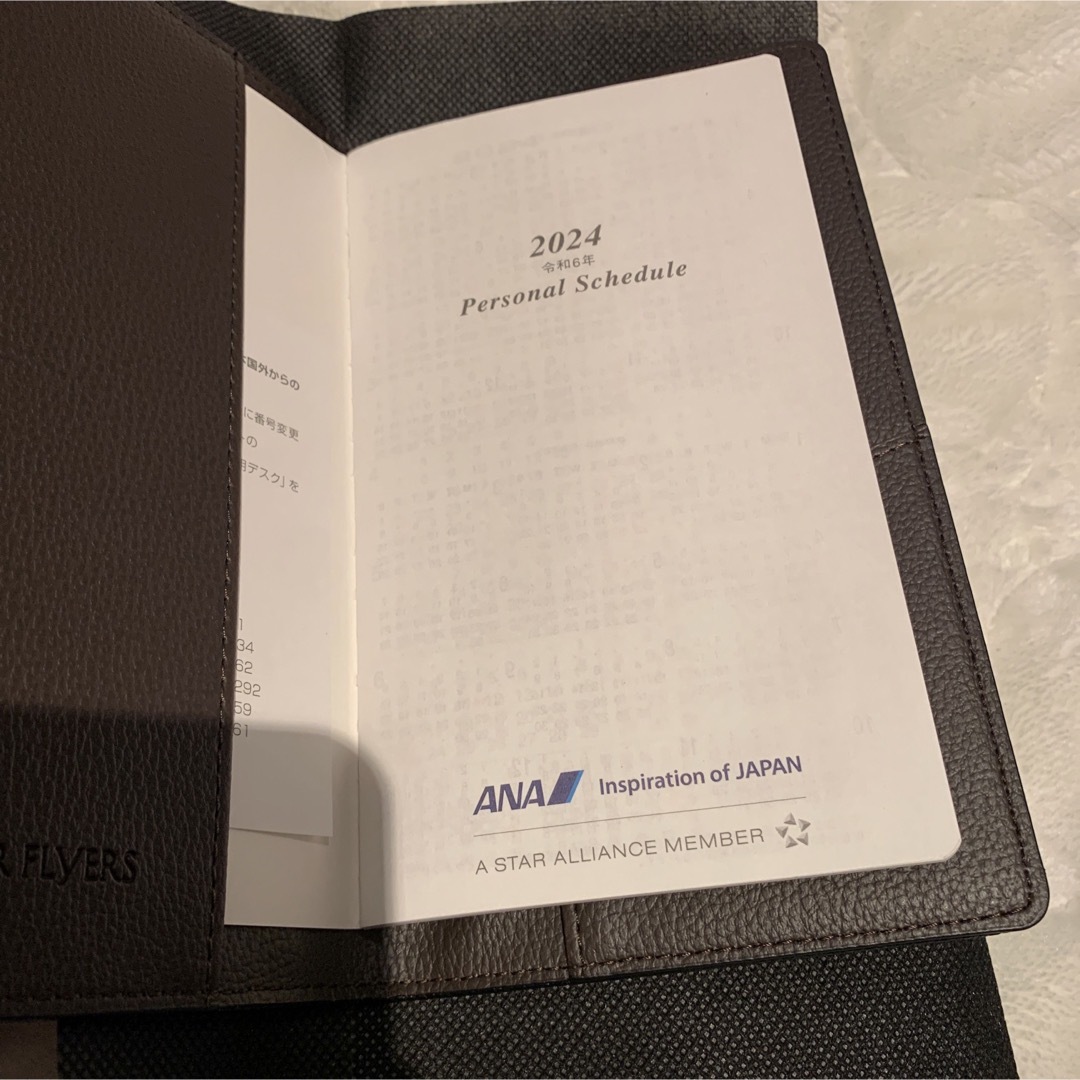 ANA(全日本空輸)(エーエヌエー(ゼンニッポンクウユ))の2024年度版ANAスーパーフライヤーズ限定手帳 メンズのファッション小物(手帳)の商品写真