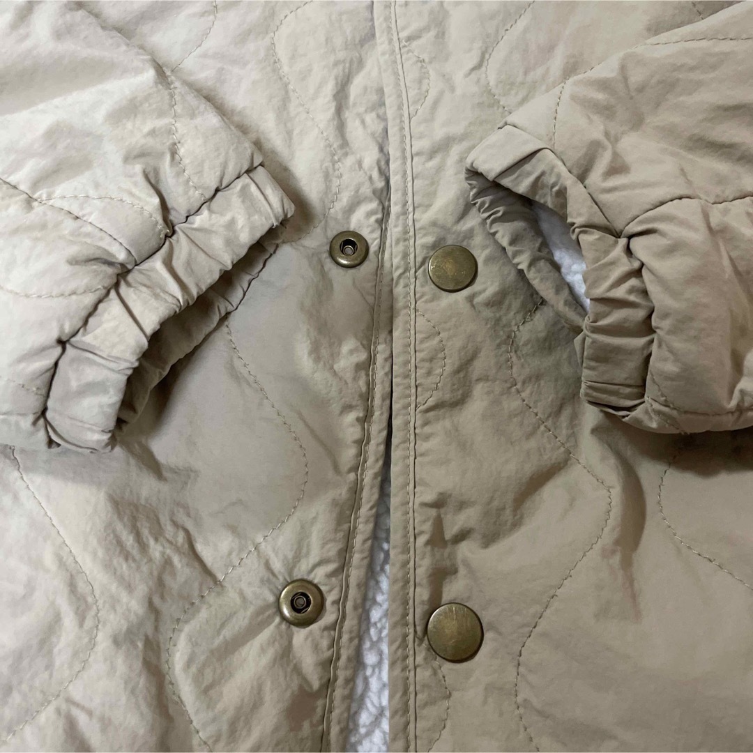 UNIQLO(ユニクロ)のキルティングボアフリースリバーシブルジャケット　110 キッズ/ベビー/マタニティのキッズ服女の子用(90cm~)(ジャケット/上着)の商品写真