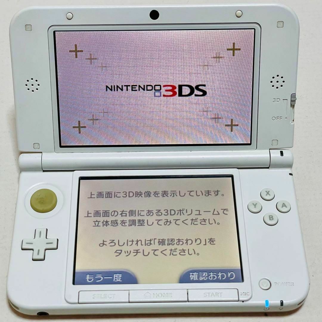 ニンテンドー 3DSLL ピンク×ホワイト 動作確認済 4GB 030のサムネイル