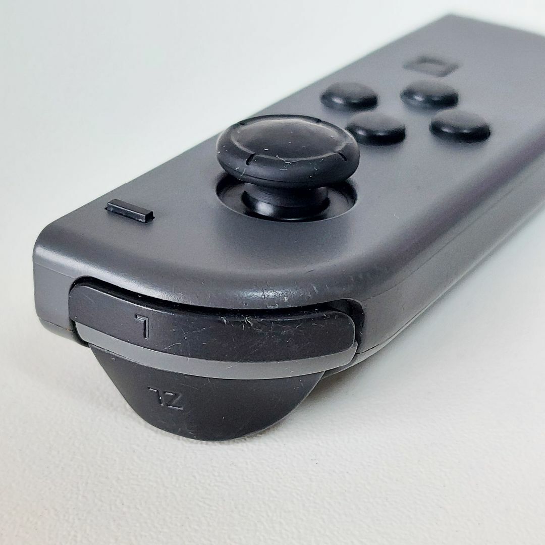 Nintendo Switch(ニンテンドースイッチ)のSwitch Joy-Con ジョイコン 左 灰色 グレー ボタン動作確認済み エンタメ/ホビーのゲームソフト/ゲーム機本体(その他)の商品写真