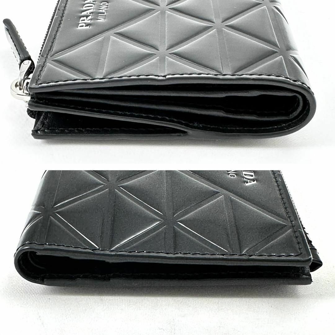 ◎極美品◎プラダ 二つ折り財布 モノリス トライアングル 三角ロゴ エンボス 黒