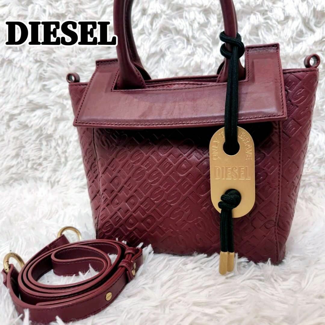 DIESEL 2way　ハンドバッグ　総柄　マテリアル　ボルドー　限定商品 レディースのバッグ(ハンドバッグ)の商品写真