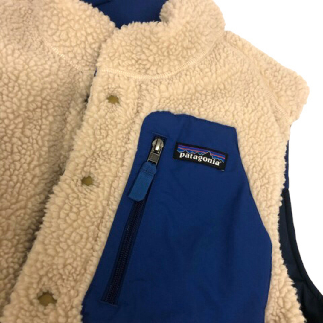 patagonia(パタゴニア)のパタゴニア ダウンベスト リバーシブル ボア ワンポイントロゴ 青 白 メンズのジャケット/アウター(ダウンベスト)の商品写真