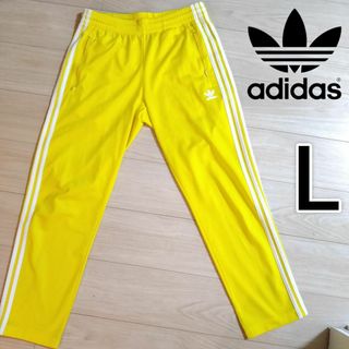 オリジナルス(Originals（adidas）)のアディダス 黄 ファイヤーバード スポーツMIXトラックパンツ ジャージ 男性L(その他)