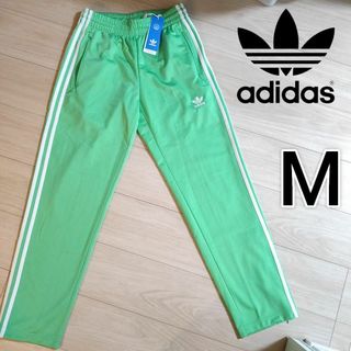 オリジナルス(Originals（adidas）)の新品タグ付き アディダス 緑 ファイヤーバード トラックパンツ ジャージ 男性M(その他)