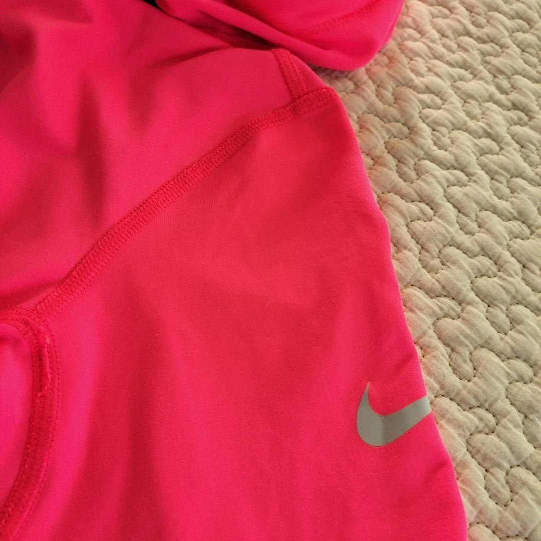 NIKE(ナイキ)のNIKE　ナイキ　DRI-FIT レディース　パーカー ピンク　Mサイズ レディースのトップス(パーカー)の商品写真