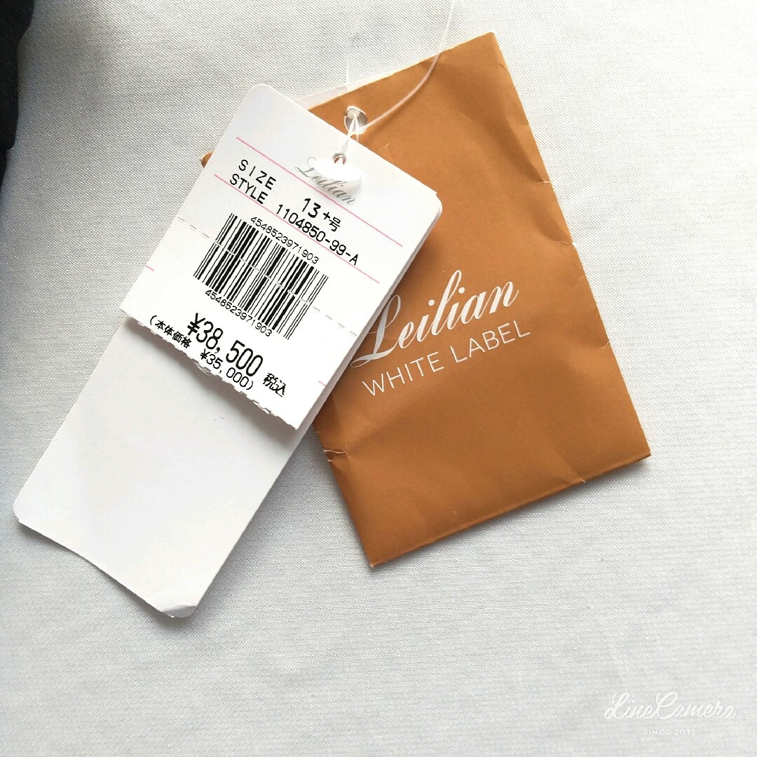 leilian(レリアン)の新品タグ付　レリアン　フレアースカート　黒　定価38500円　XL  リボン レディースのスカート(ひざ丈スカート)の商品写真