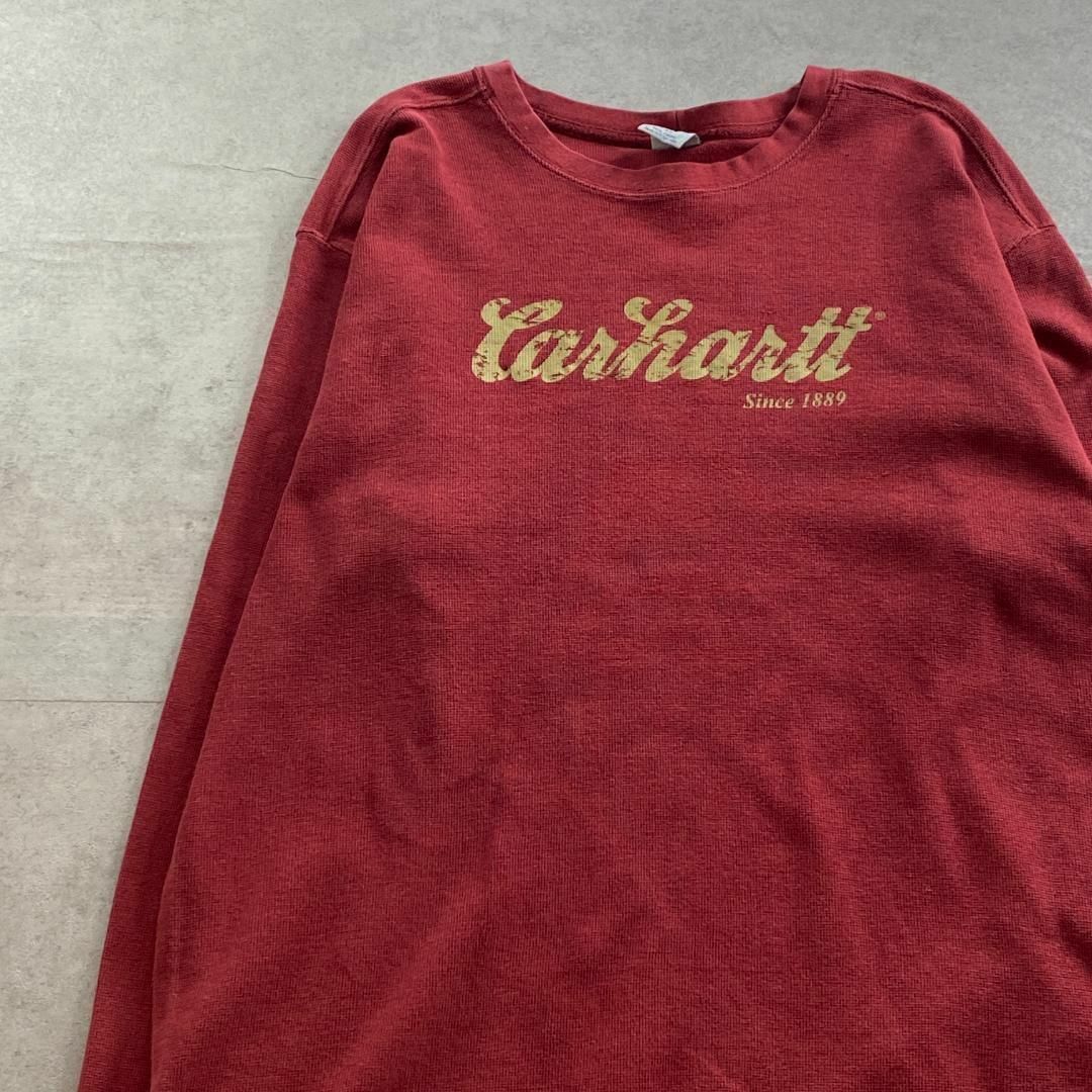 carhartt(カーハート)のカーハート　長袖カットソー　プリントロゴ　ブランドロゴ　古着　レッド　XL メンズのトップス(Tシャツ/カットソー(七分/長袖))の商品写真