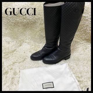 グッチ(Gucci)の✨ほぼ未使用✨GUCCI ロングブーツ シマレザー 専用袋付き 黒 23.5cm(ブーツ)