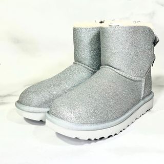 アグ(UGG)の【レア新品未使用】UGGミニ ベイリー ボウ スパークル ブーツシルバー23.0(ブーツ)