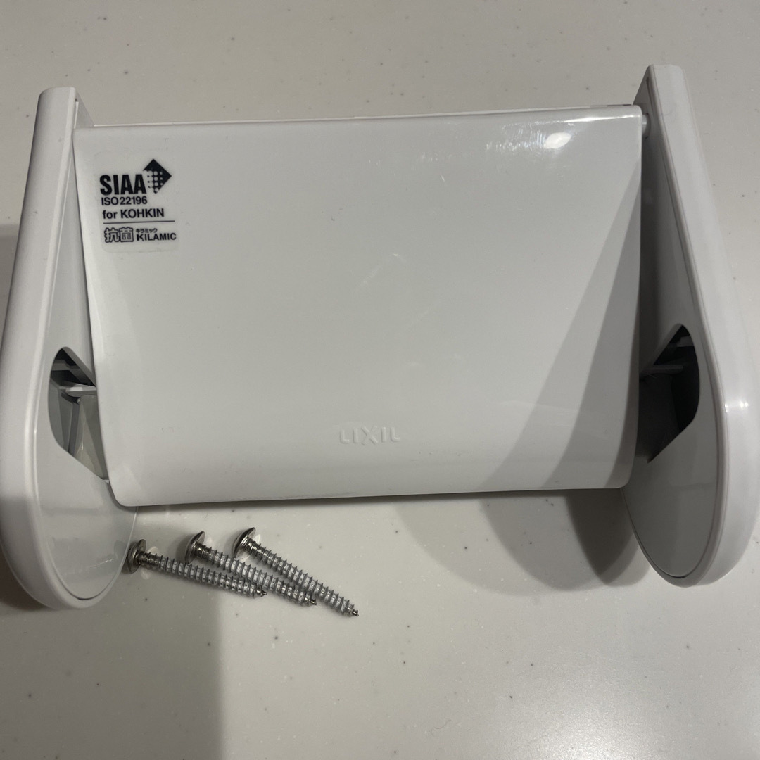 LIXIL ワンタッチ式 トイレットペーパーホルダー  インテリア/住まい/日用品の収納家具(トイレ収納)の商品写真