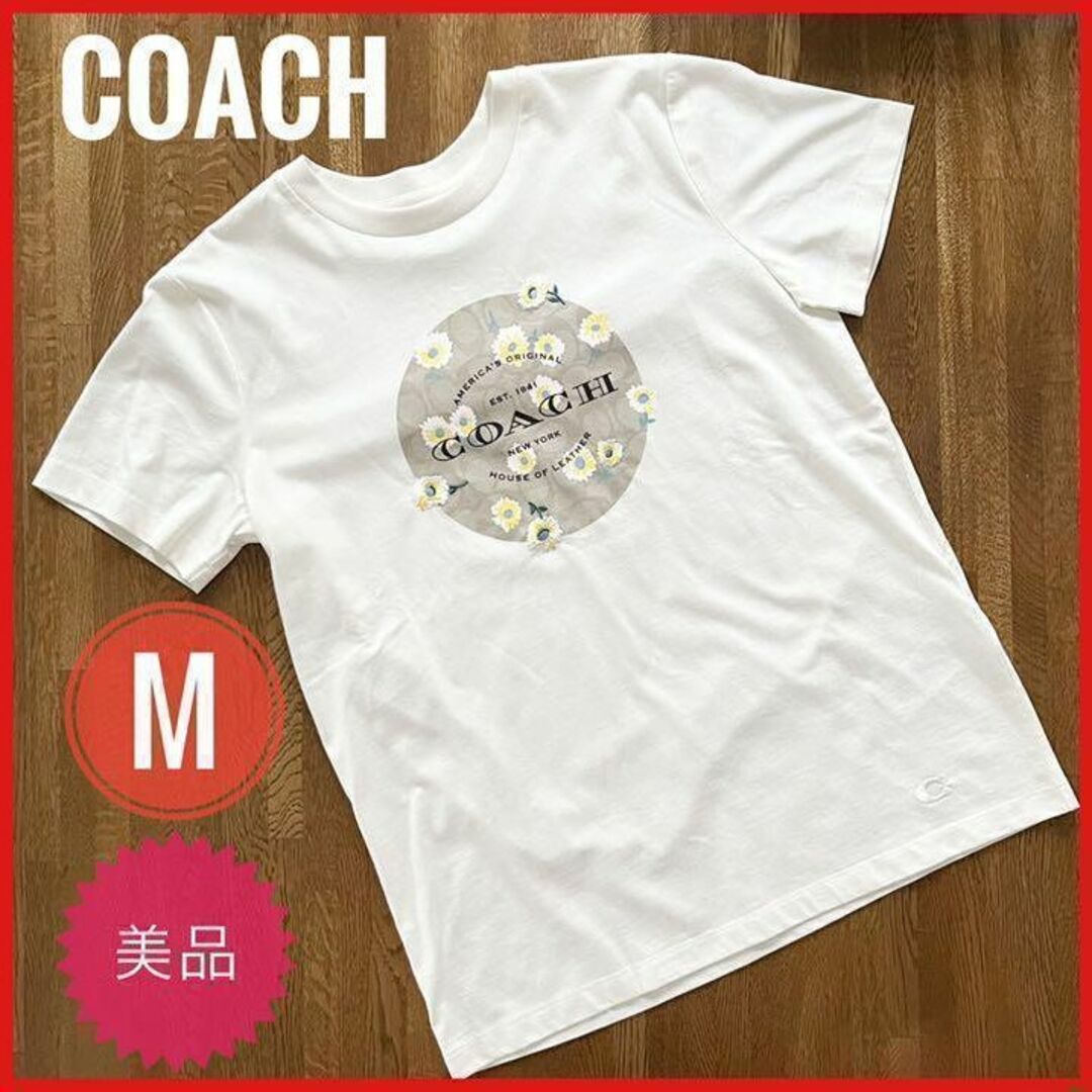 COACH(コーチ)の【美品】COACH コーチ Tシャツ 半袖 シグネチャー 花柄 白 Mサイズ相当 レディースのトップス(Tシャツ(半袖/袖なし))の商品写真