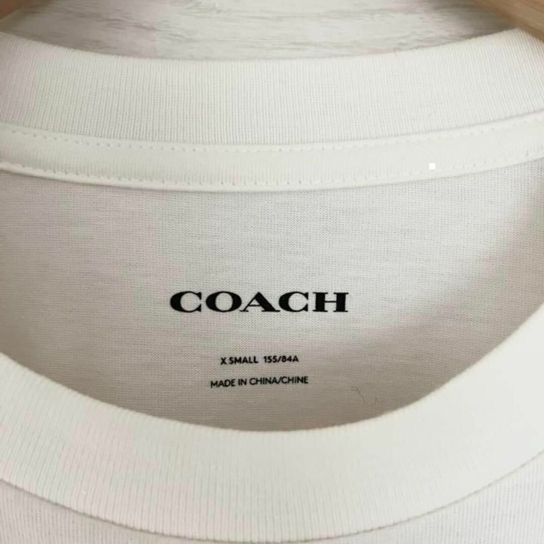 COACH(コーチ)の【美品】COACH コーチ Tシャツ 半袖 シグネチャー 花柄 白 Mサイズ相当 レディースのトップス(Tシャツ(半袖/袖なし))の商品写真