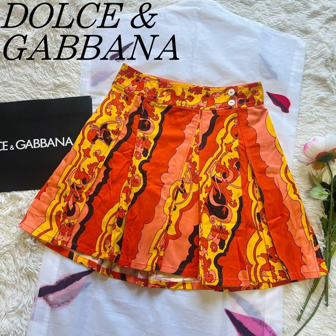 DOLCE&GABBANA(ドルチェアンドガッバーナ)の【美品】DOLCE&GABBANA 膝丈スカート 総柄 オレンジ 40 フレア レディースのスカート(ひざ丈スカート)の商品写真