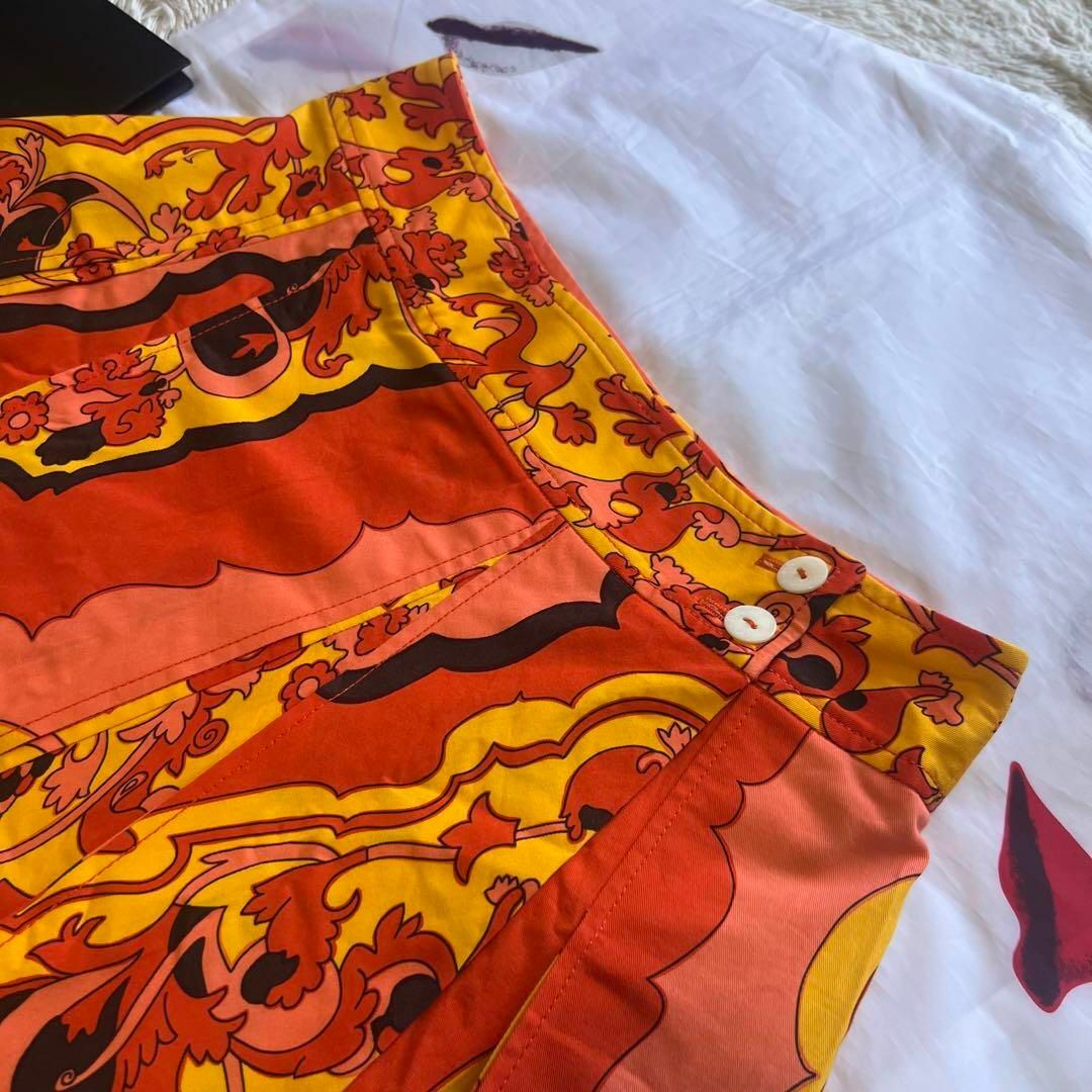 DOLCE&GABBANA(ドルチェアンドガッバーナ)の【美品】DOLCE&GABBANA 膝丈スカート 総柄 オレンジ 40 フレア レディースのスカート(ひざ丈スカート)の商品写真