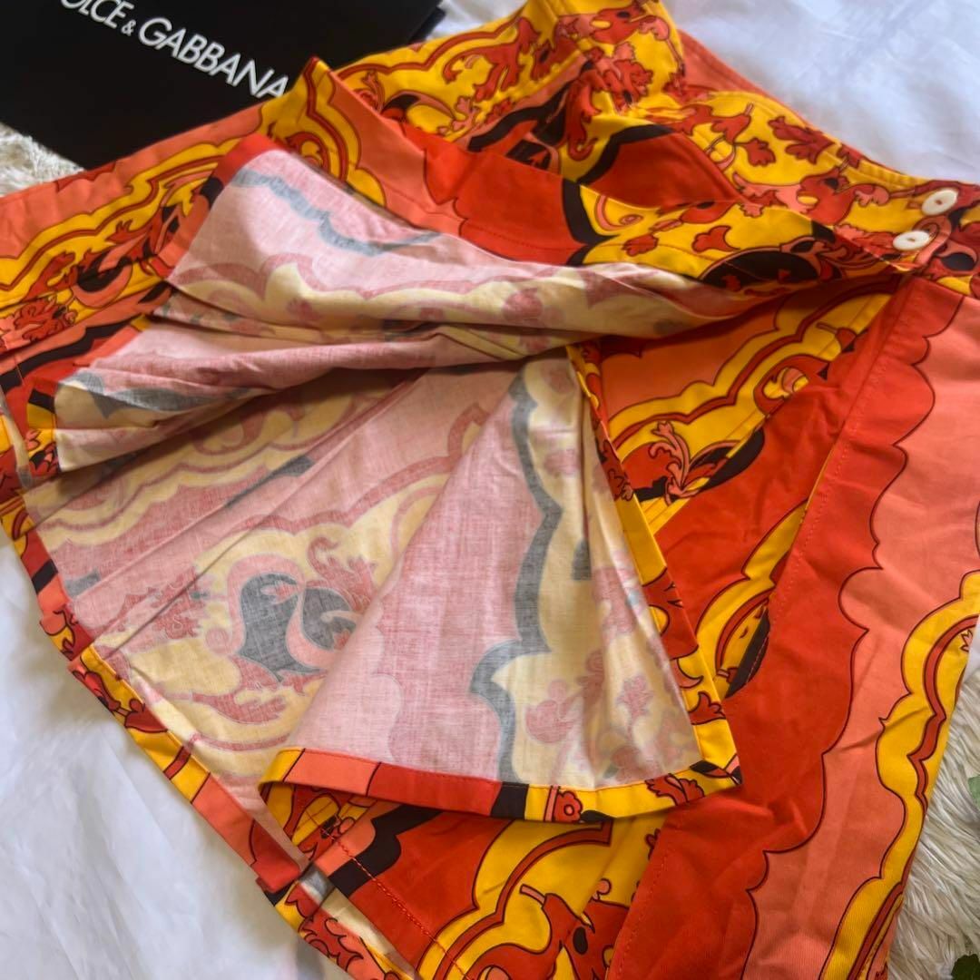 DOLCE&GABBANA(ドルチェアンドガッバーナ)の【美品】DOLCE&GABBANA 膝丈スカート 総柄 オレンジ 40 フレア レディースのスカート(ひざ丈スカート)の商品写真