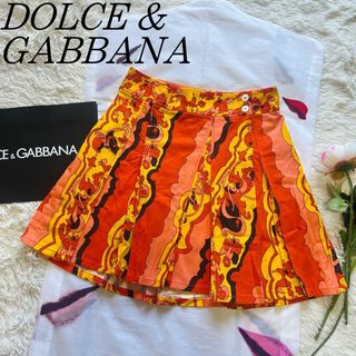 ドルチェアンドガッバーナ(DOLCE&GABBANA)の【美品】DOLCE&GABBANA 膝丈スカート 総柄 オレンジ 40 フレア(ひざ丈スカート)