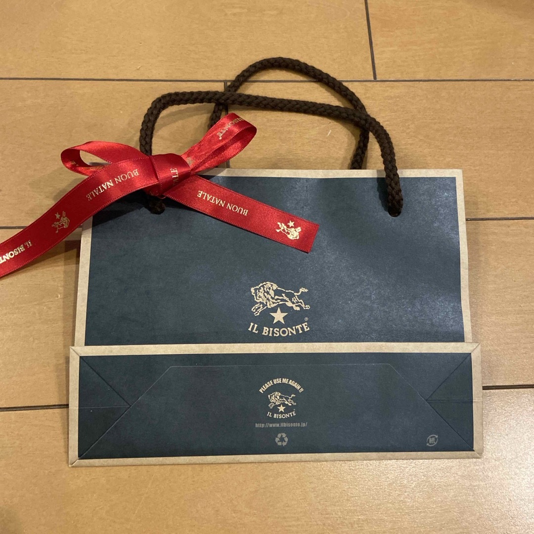 IL BISONTE(イルビゾンテ)のイルビゾンテ　紙袋　リボン レディースのバッグ(ショップ袋)の商品写真