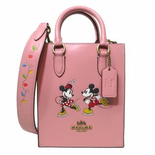 コーチ(COACH)の【新品】コーチ バッグ ショルダーバッグ COACH X DISNEY コーチ × ディズニー ミッキー ミニー アイススケートモチーフ ノース/サウス ミニ トート 2WAY 斜め掛け CN023 B4OFE(ライトブラッシュマルチ)コラボ商品 アウトレット レディース(ショルダーバッグ)