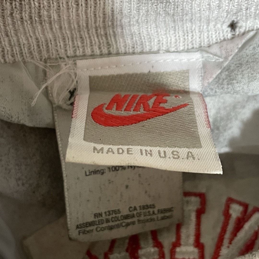 NIKE - nike 90s スウェットスタジャン ボロダメージ 加工 USA製 NIKE - nike 90s スウェットスタジャン ボロダメージ 加工 USA製