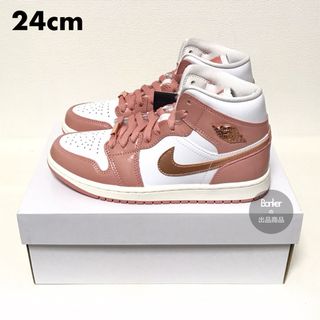 ナイキ(NIKE)の24《新品》ナイキ NIKE WMNS AIR JORDAN 1 MID ピンク(スニーカー)