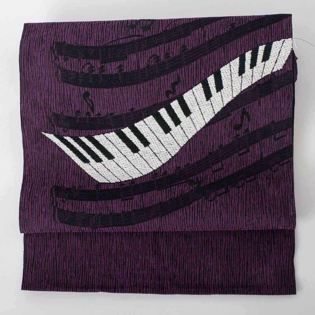 西陣織 九寸名古屋帯 ピアノ 音符 演奏 正絹 未仕立て 新品 メルヘン調 紫九寸名古屋帯