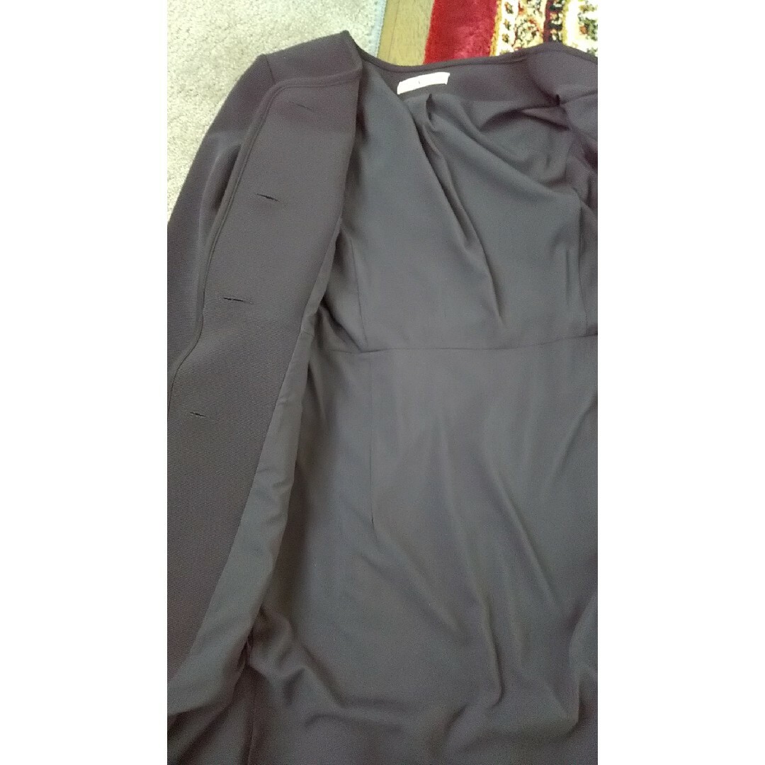 amel(エイメル)のノーカラーロングジャケット レディースのジャケット/アウター(ノーカラージャケット)の商品写真
