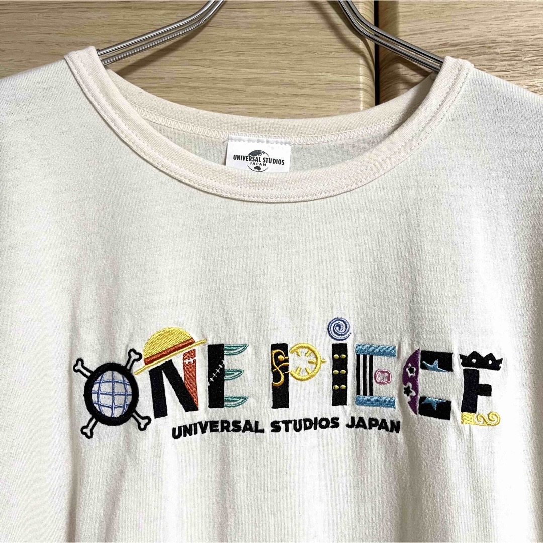 USJ(ユニバーサルスタジオジャパン)のUSJ ワンピース プレサマ 刺繍Tシャツ 麦わらの一味 Lサイズ ウィメンズ メンズのトップス(Tシャツ/カットソー(半袖/袖なし))の商品写真