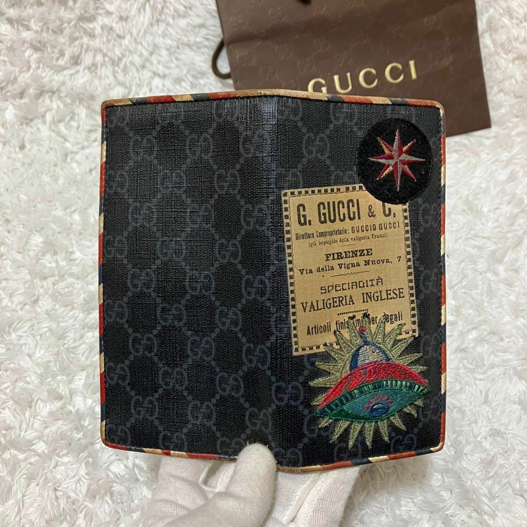 Gucci(グッチ)の【超希少】GUCCI グッチ　ナイトクーリエ　長財布　二つ折り　黒　定期入れ　黒 メンズのファッション小物(長財布)の商品写真