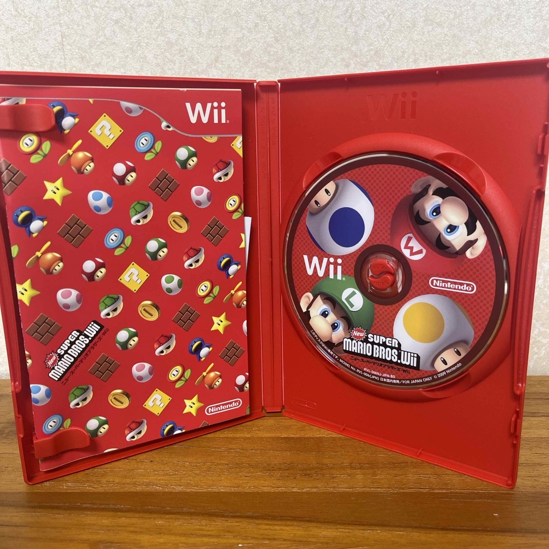 中古品　New スーパーマリオブラザーズ Wii エンタメ/ホビーのゲームソフト/ゲーム機本体(家庭用ゲームソフト)の商品写真