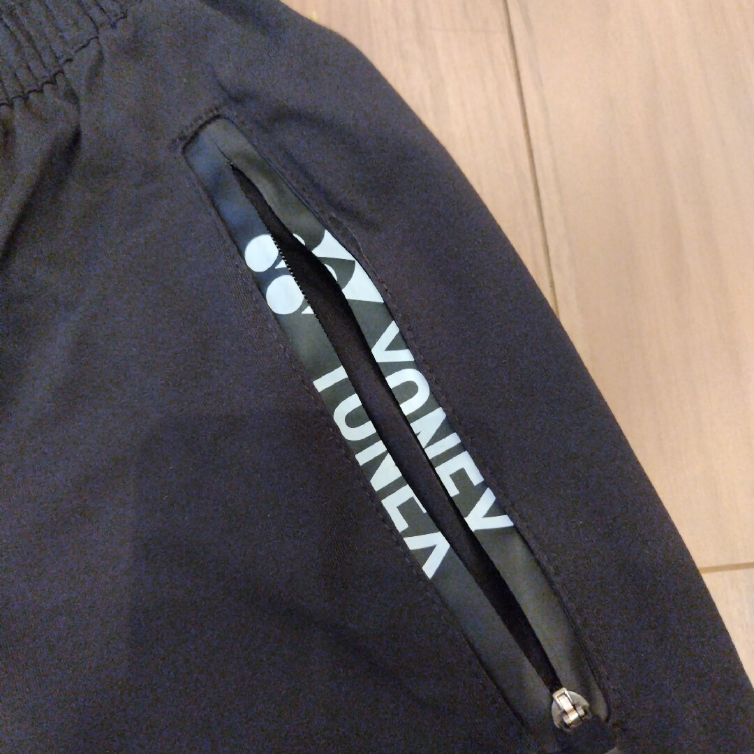 YONEX(ヨネックス)のYONEX　七分丈パンツ　ブラック/オレンジ　XL スポーツ/アウトドアのスポーツ/アウトドア その他(バドミントン)の商品写真