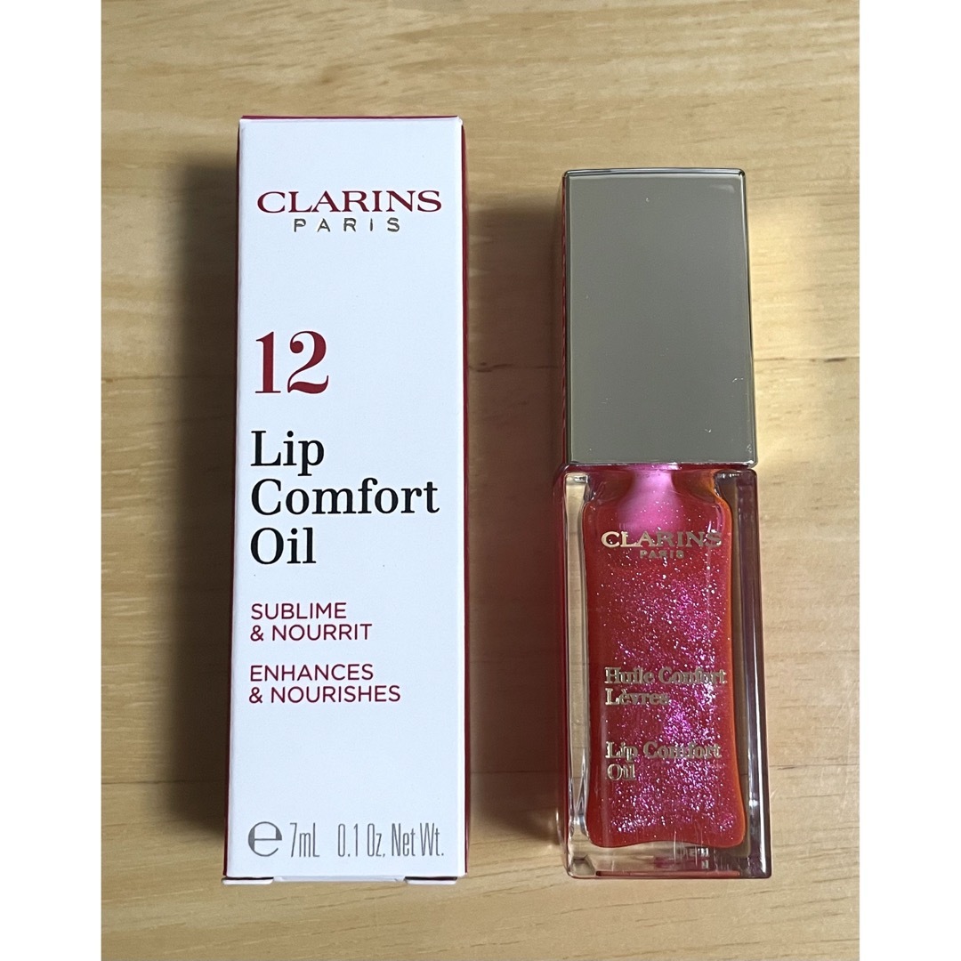 CLARINS(クラランス)の【新品未使用】クラランス コンフォートリップオイル 12 キャンディグラム コスメ/美容のベースメイク/化粧品(リップグロス)の商品写真