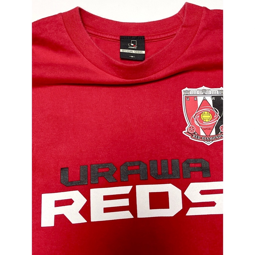 浦和レッズユニフォームＴシャツ (古着) 半袖 Ｍ スポーツ/アウトドアのサッカー/フットサル(応援グッズ)の商品写真