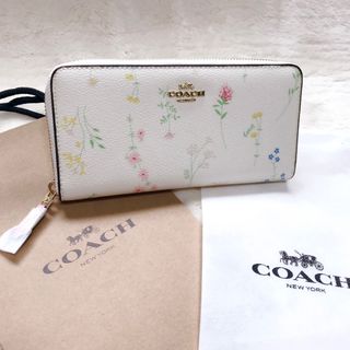 コーチ(COACH)の新品 COACH コーチ ラウンドファスナー 長財布 フローラル 白 フラワー(財布)