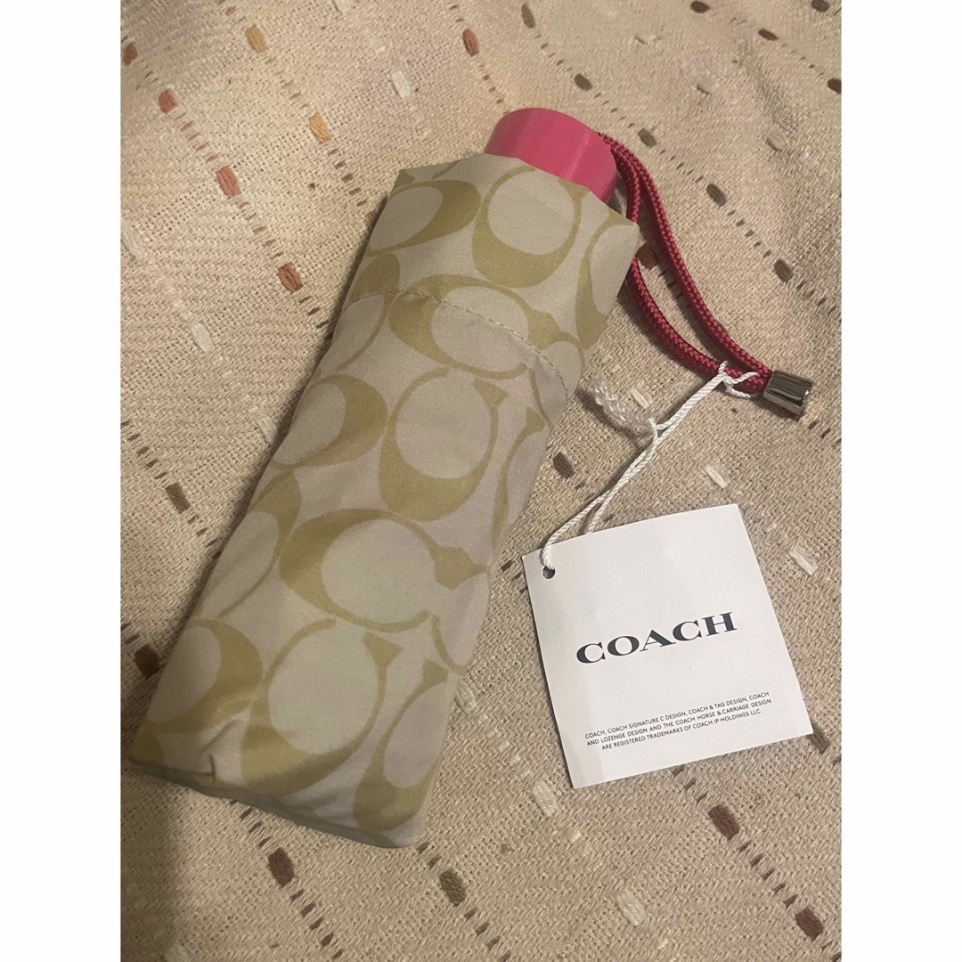 COACH(コーチ)のコーチ　★ COACH 折りたたみ傘　ピンク　ギフト レディースのファッション小物(傘)の商品写真