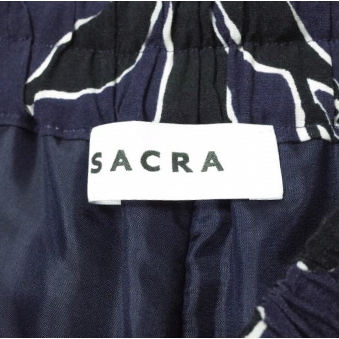 SACRA(サクラ)のSACRA サクラ 23SS 日本製 SHADOW LEAF PANTS リーフプリント ワイドイージーパンツ 123108112 38 ネイビー ボトムス【中古】【SACRA】 レディースのパンツ(カジュアルパンツ)の商品写真