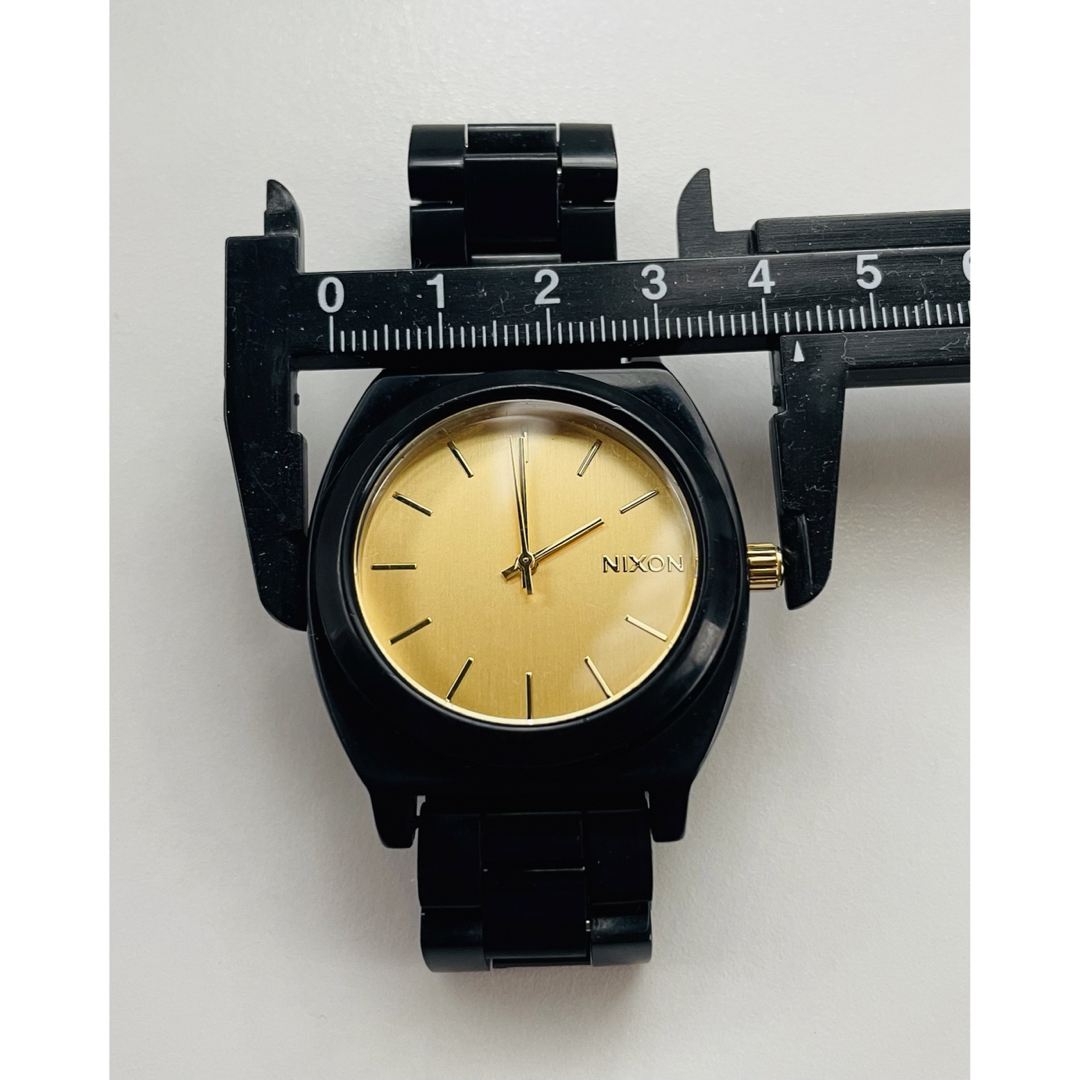 NIXON(ニクソン)の【電池新品の美品】NIXONのTIME TELLER  ブラック×ゴールド② レディースのファッション小物(腕時計)の商品写真