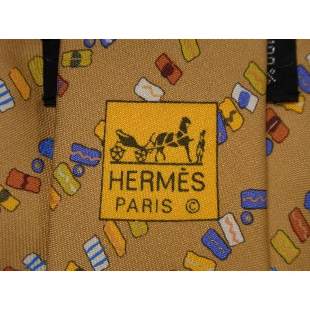 Hermes(エルメス)のHERMES エルメス シルク100% 総柄 ネクタイ ビジネス メンズ ライトブラウン系 DD4445 メンズのファッション小物(ネクタイ)の商品写真