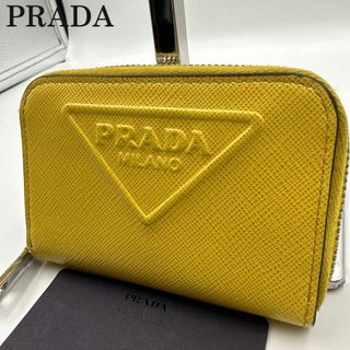 プラダ(PRADA)の未使用級・現行品✨プラダ　エンボスレザー　トラインアングル　2MM033 黄色(財布)