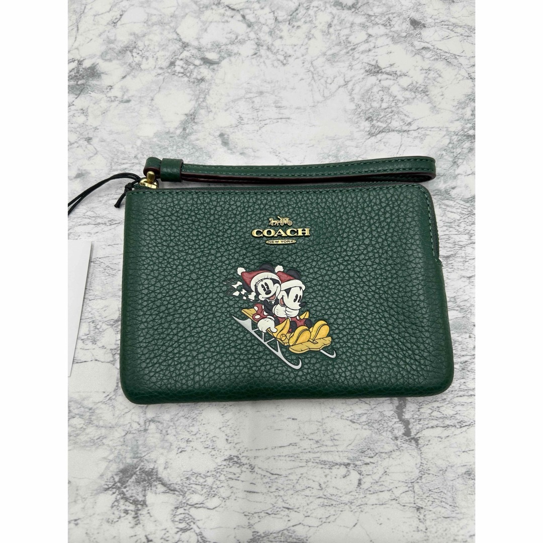 COACH(コーチ)のディズニー × コーチ コーナー ジップ リストレット ミッキー そりモチーフ レディースのファッション小物(ポーチ)の商品写真