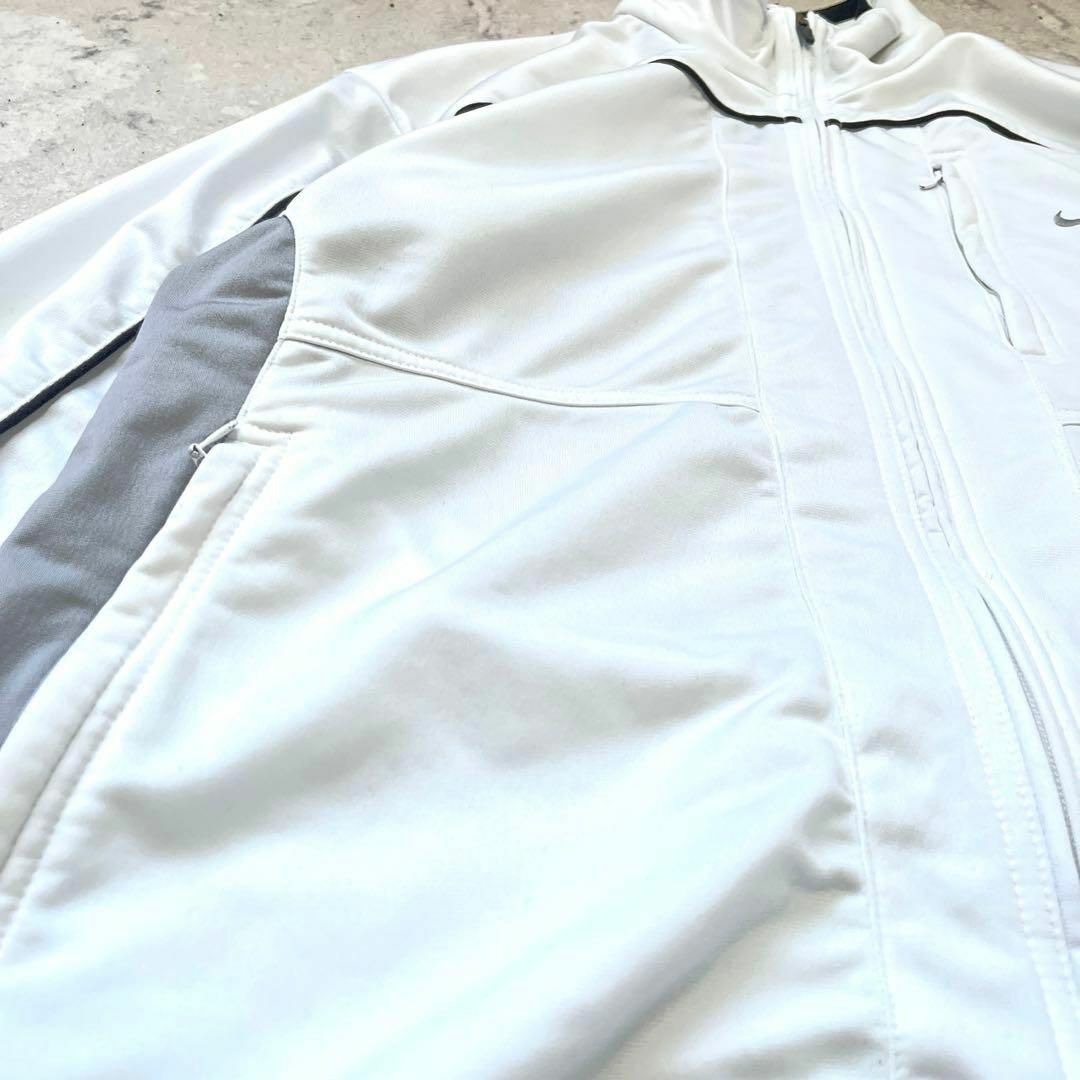 NIKE(ナイキ)の【90s ナイキ】Lサイズ相当 刺繍ロゴ トラックジャケット 白 nike メンズのトップス(ジャージ)の商品写真