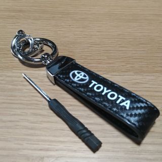 トヨタ(トヨタ)のトヨタカ―ボンファイバー柄レザーキ―ホルダー激安価格値引き不可(車内アクセサリ)