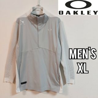 オークリー(Oakley)の【OAKLEY】美品オークリースカルロゴ モックネックニット メンズＸＬ ゴルフ(ウエア)