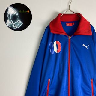 プーマ(PUMA)の【PUMA　トラックジャケット　プリントデザイン　バイカラー　青　赤　古着】(その他)