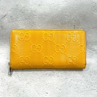 グッチ(Gucci)のグッチ GGエンボスレザー ジップアランドウォレット 長財布 イエロー ロゴ(長財布)