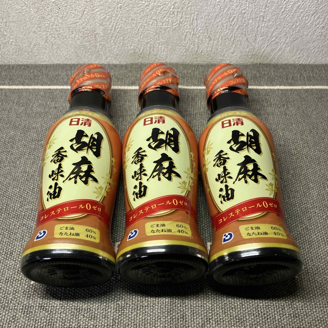 日清食品(ニッシンショクヒン)のごま油　食用調理油　日清 食品/飲料/酒の食品(調味料)の商品写真