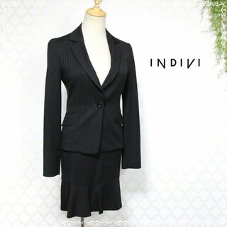 インディヴィ(INDIVI)のインディビ　スカートスーツ　黒　ストライプ　36　38　サイズ違い(スーツ)