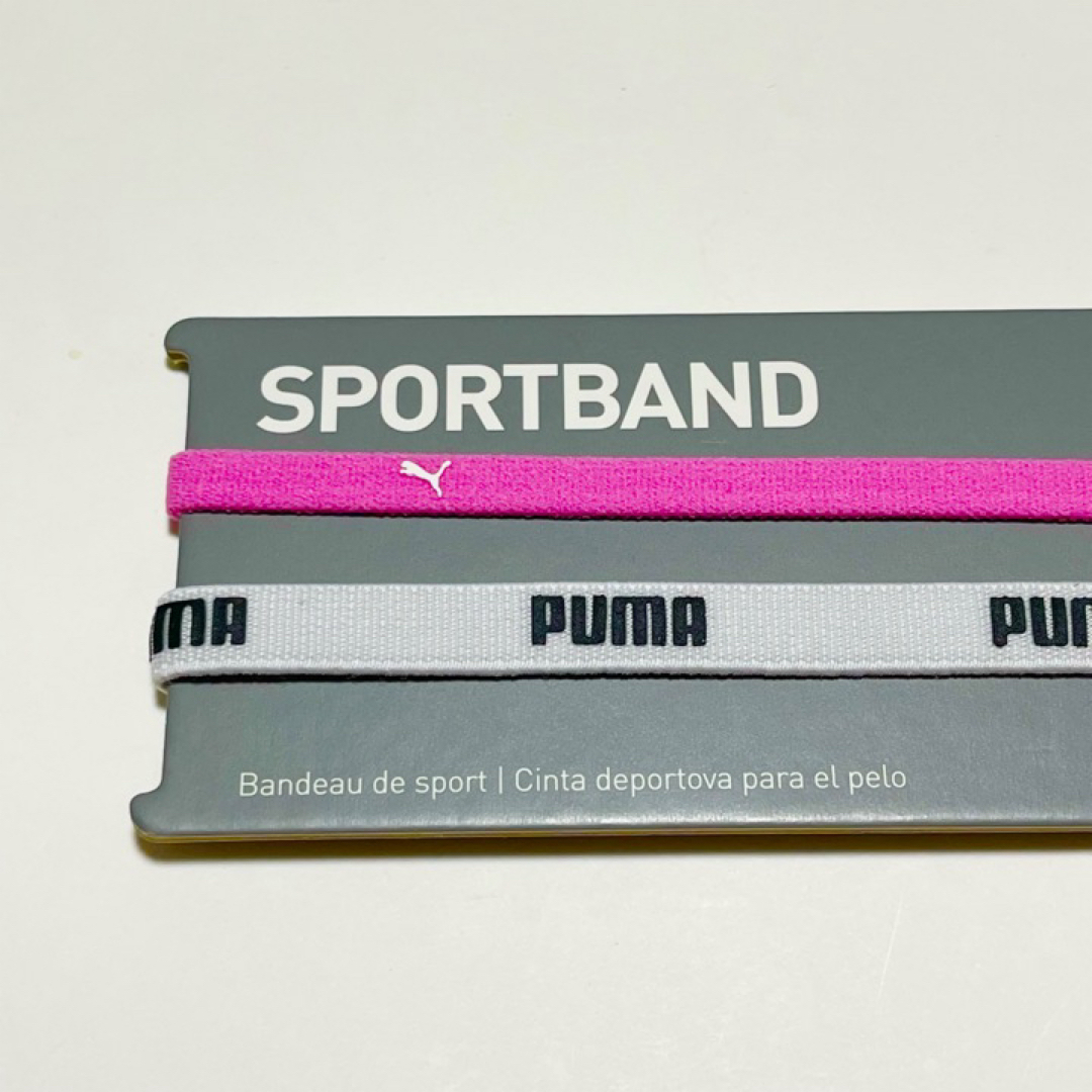 PUMA(プーマ)の新品・送料無料 PUMA 細いヘアバンド 2本セット パープル　ホワイト スポーツ/アウトドアのサッカー/フットサル(その他)の商品写真