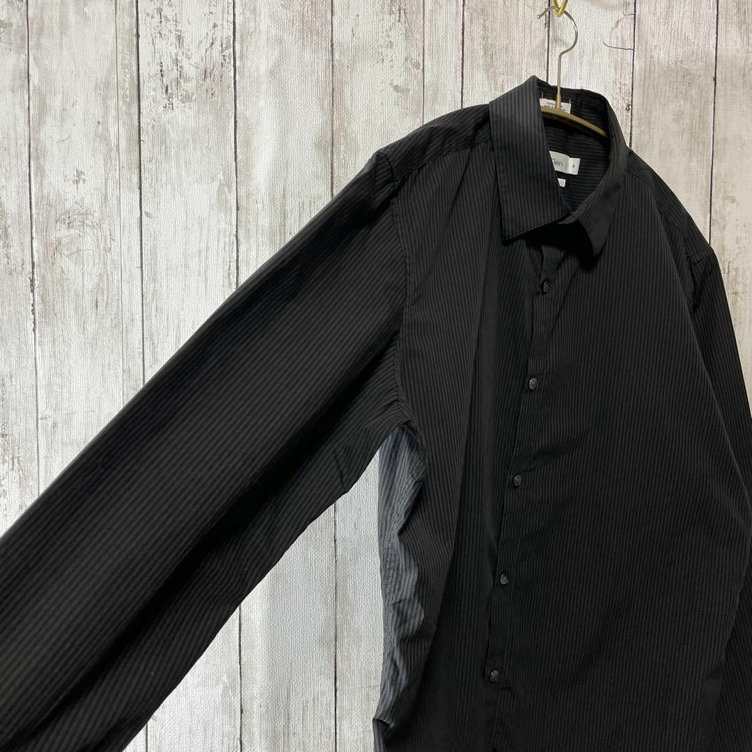 Calvin Klein(カルバンクライン)のカルバンクライン　黒ブラックストライプ　縦縞　薄手　ＣＫ　奇麗目シルエット　古着 メンズのトップス(シャツ)の商品写真