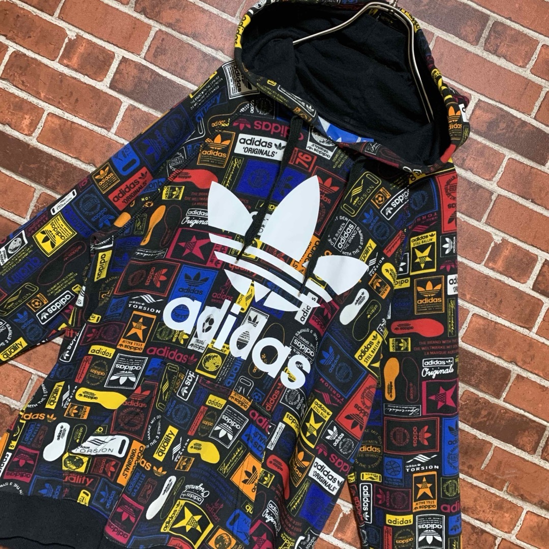 総柄★アディダス adidas デカロゴパーカー マルチカラー プルオーバー 黒